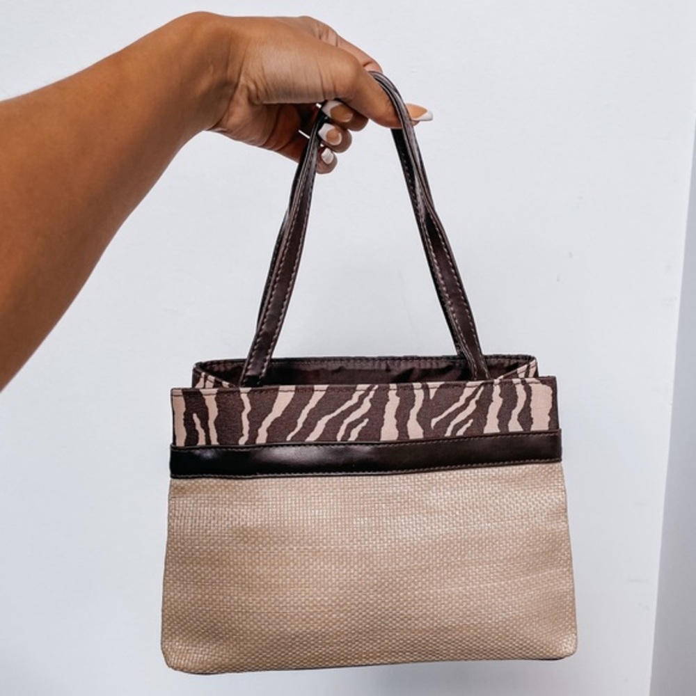 2000s Estee Lauder zebra print straw handbag